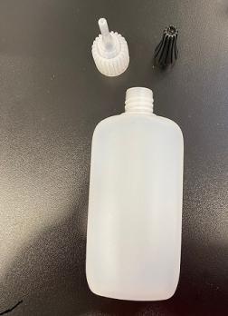 100 ml  Leerflasche Oval Plastik mit Dosierspitze und Verschluss 